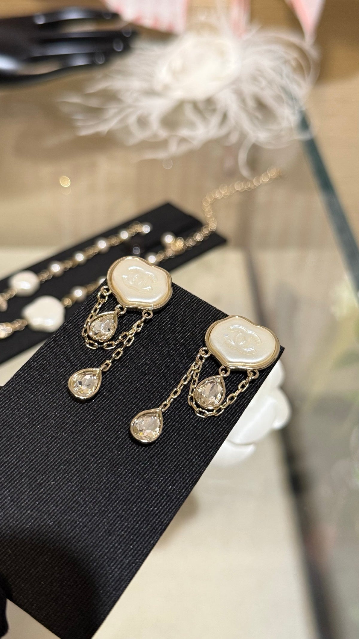 Chanel Cloud Double C Resin Double Teardrop Crystal Light Gold Chain Tassel Earrings